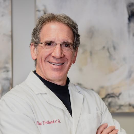 Dr. Paul Tortland smiling