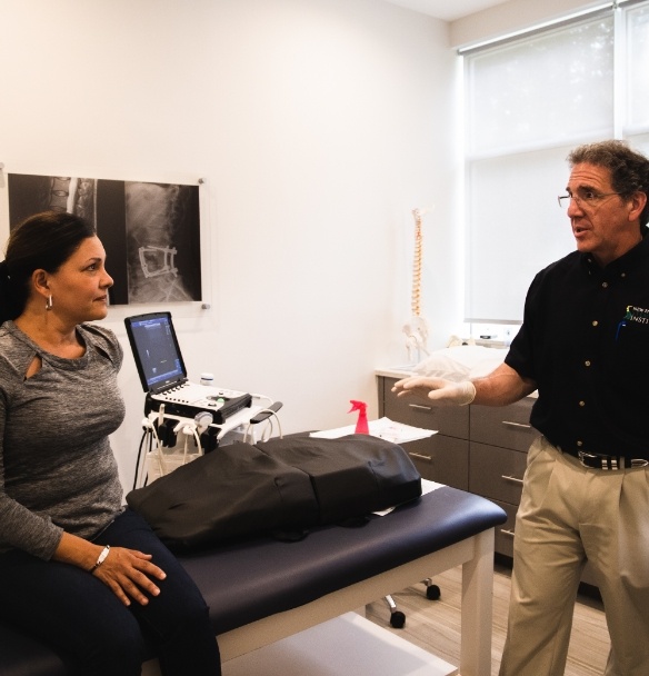 doctor talking to patient